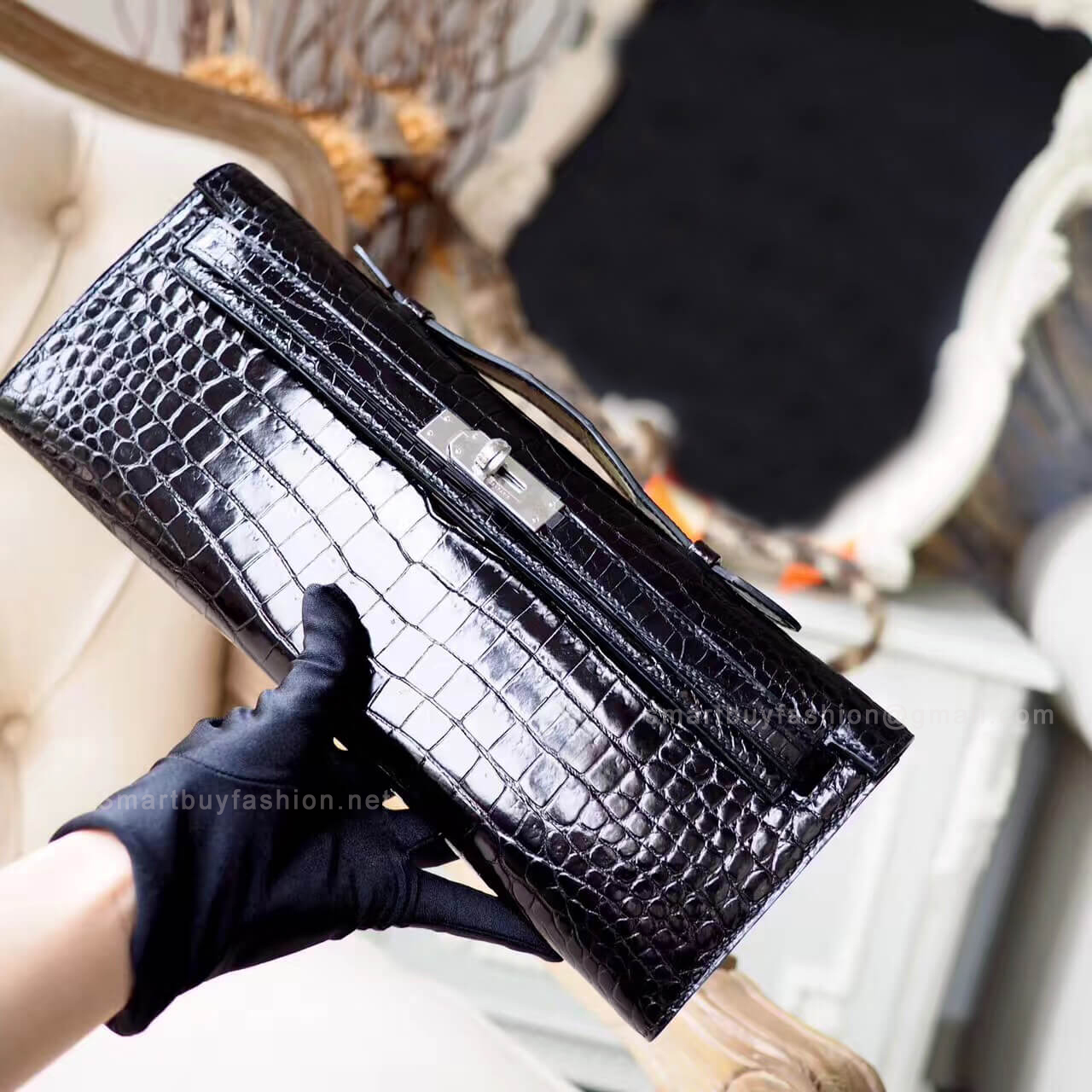 Hermes Kelly Cut 31 Clutch in ck89 Noir Shiny Porosus Croc PHW
